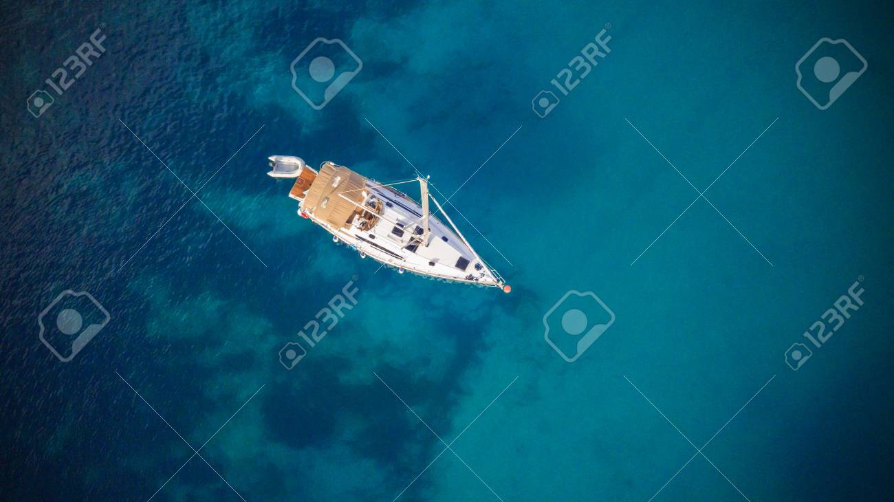Aerial view of sailling boat. Outdoor water sports, yachting. - 101280223 Aerial view of sailling boat. Outdoor water sports, yachting. - 101280223