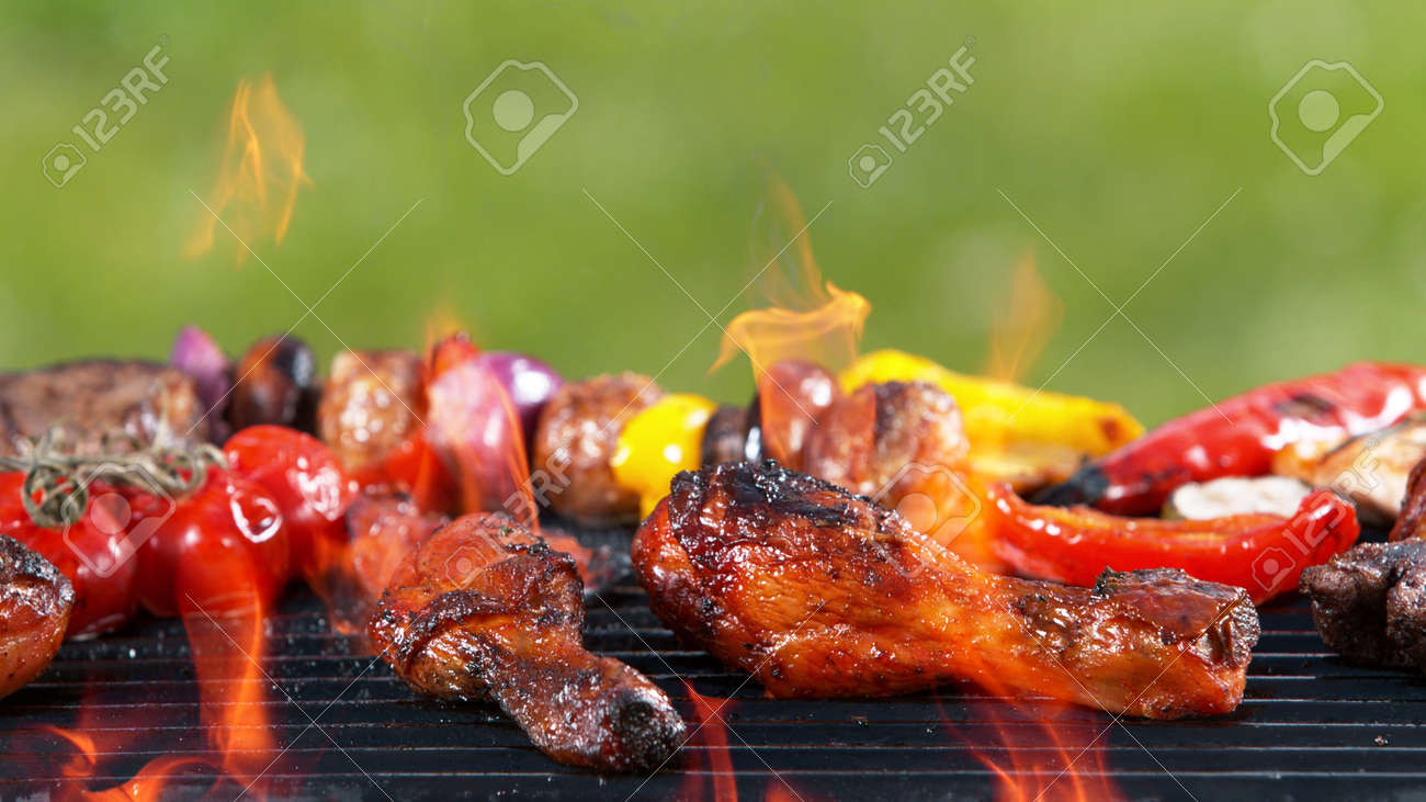 Assorted delicious grilled fish meat with vegetables. Outdoor grill barbecue mix. - 168969311 Assorted delicious grilled fish meat with vegetables. Outdoor grill barbecue mix. - 168969311