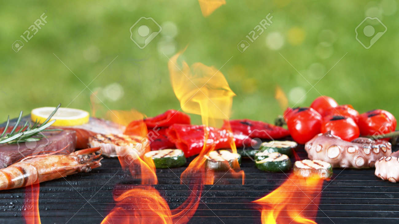 Assorted delicious grilled fish meat with vegetables. Outdoor grill barbecue mix. - 168969615 Assorted delicious grilled fish meat with vegetables. Outdoor grill barbecue mix. - 168969615