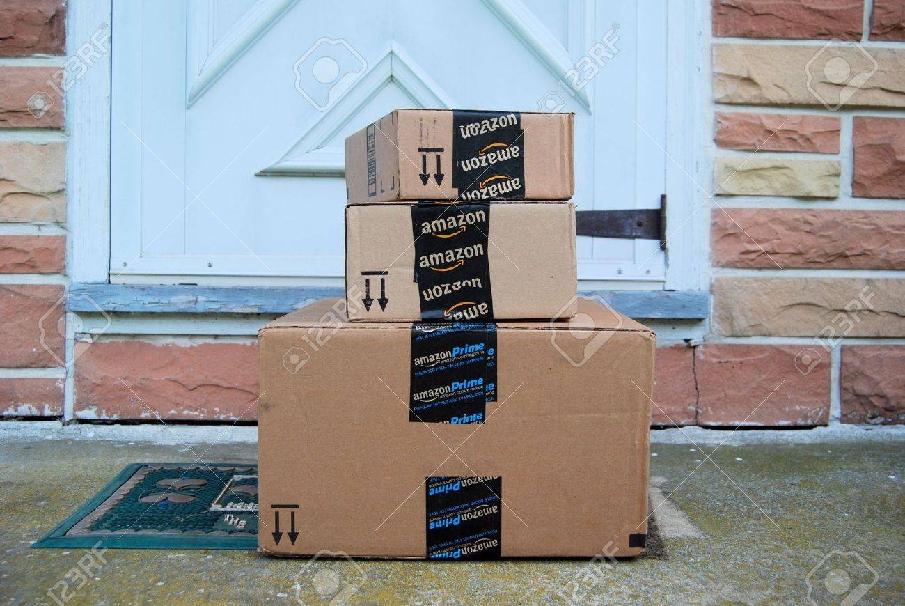 Front Door Step amazon packages on a front door step stock photo, picture and Front Door Step amazon packages on a front door step stock photo, picture and