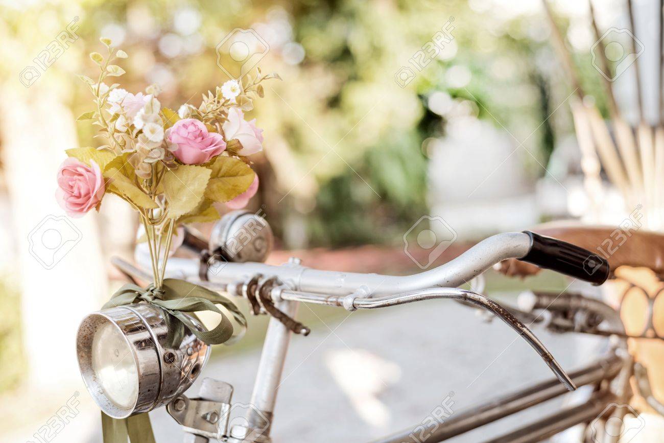 Old Bicycle And Flowers, Vintage And Retro Style Stock Photo, Picture and  Royalty Free Image. Image 35970670., image size:1300x867