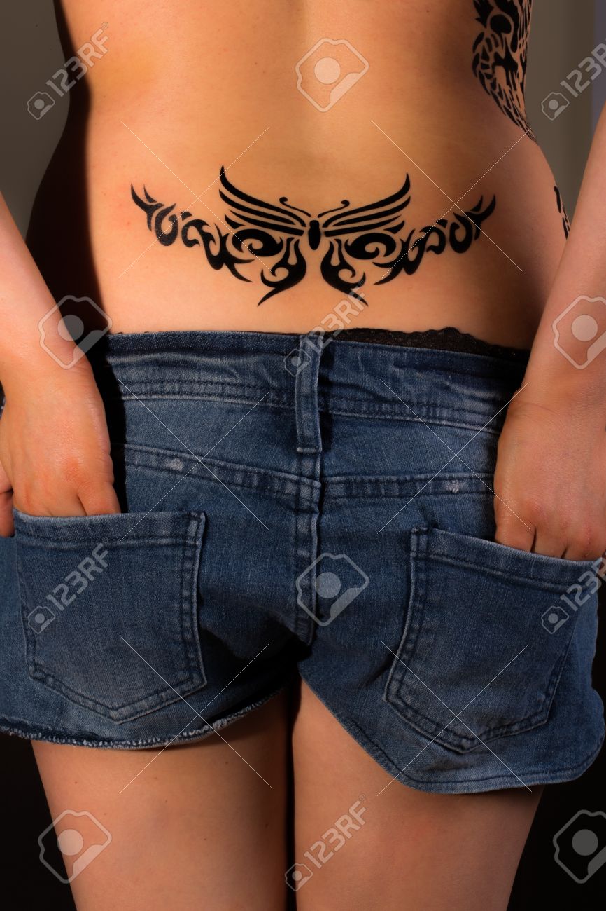 Beautiful Female With Tribal Tattoos On Her Back Stock Photo Beautiful Female With Tribal Tattoos On Her Back Stock Photo