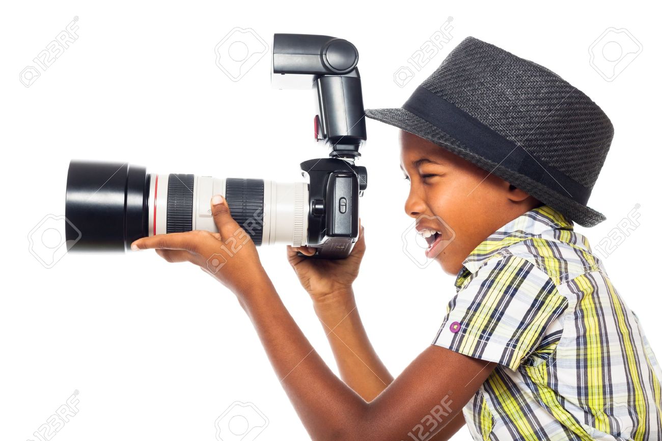 Child boy taking photo with professional camera, isolated on white background. - 16250150 Child boy taking photo with professional camera, isolated on white background. - 16250150