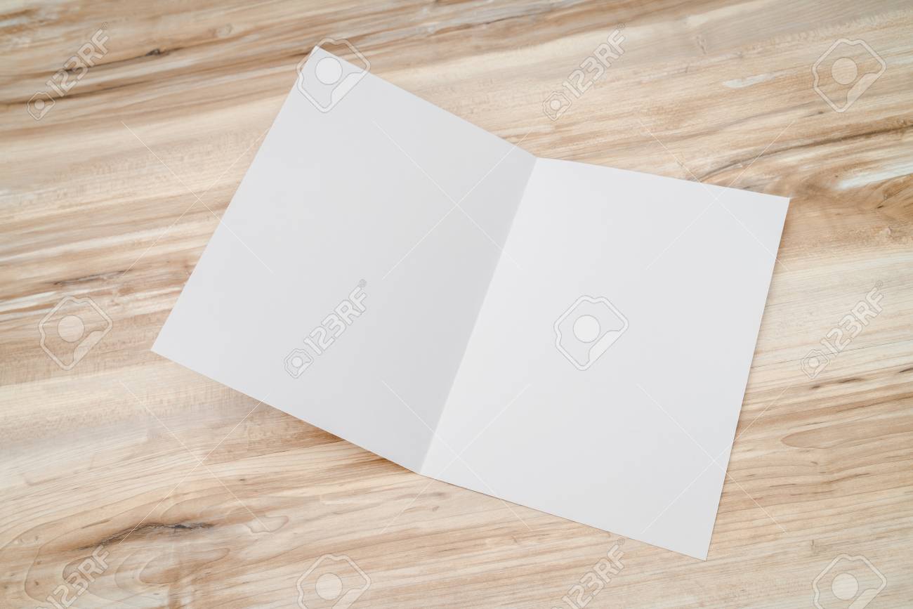 bifold white template paper on wood texture stock photo picture and