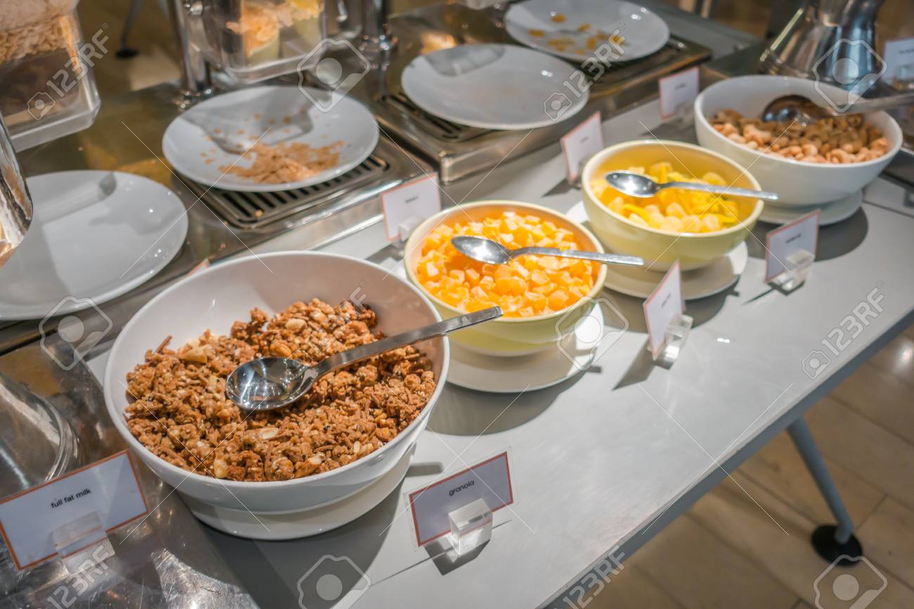 Cereal Dispensers Offering Various Kind Of Cereals In Buffet At Hotel  Restaurant Stock Photo, Picture and Royalty Free Image. Image 64238728., image size:1300x866