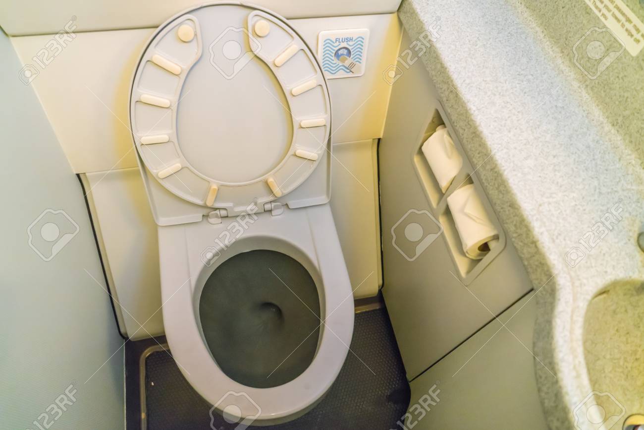 Aircraft lavatory toilets aboard a jetliner airplane - 65303519 Aircraft lavatory toilets aboard a jetliner airplane - 65303519