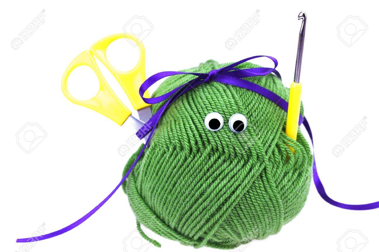 skein of wool with eyes, ribbon, scissors and crochet hooks isolated on white - 8230500 skein of wool with eyes, ribbon, scissors and crochet hooks isolated on white - 8230500