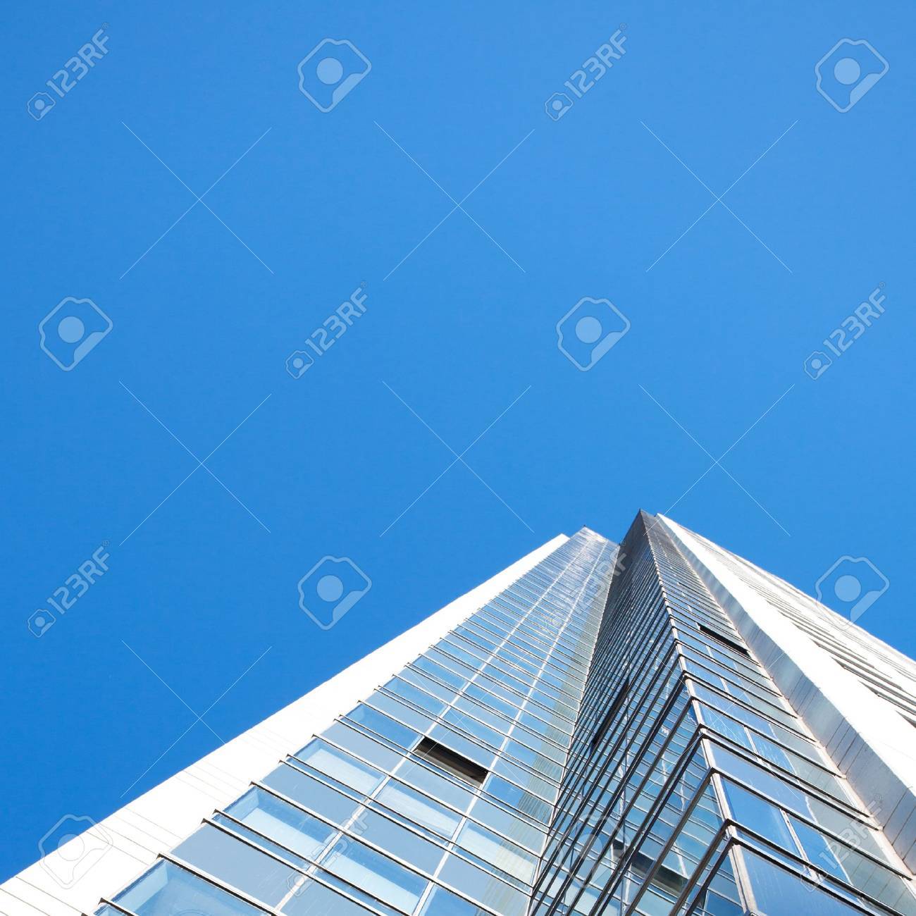 Beautiful modern office building against the blue sky - 13995107 Beautiful modern office building against the blue sky - 13995107