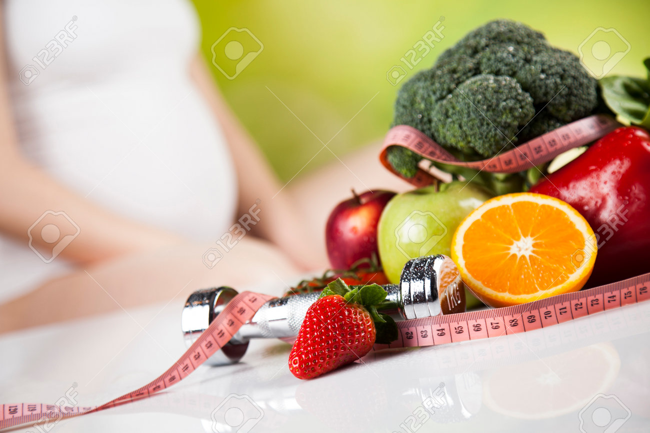 Pregnancy, healthy food and people concept - 83064637 Pregnancy, healthy food and people concept - 83064637