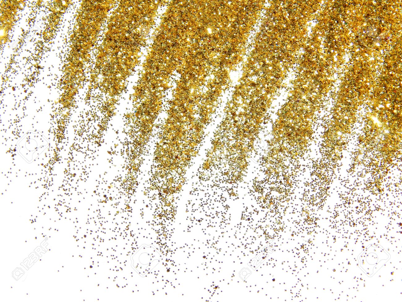 白い背景の上の黄金の雨のような金色のキラキラ輝き の写真素材 画像素材 Image