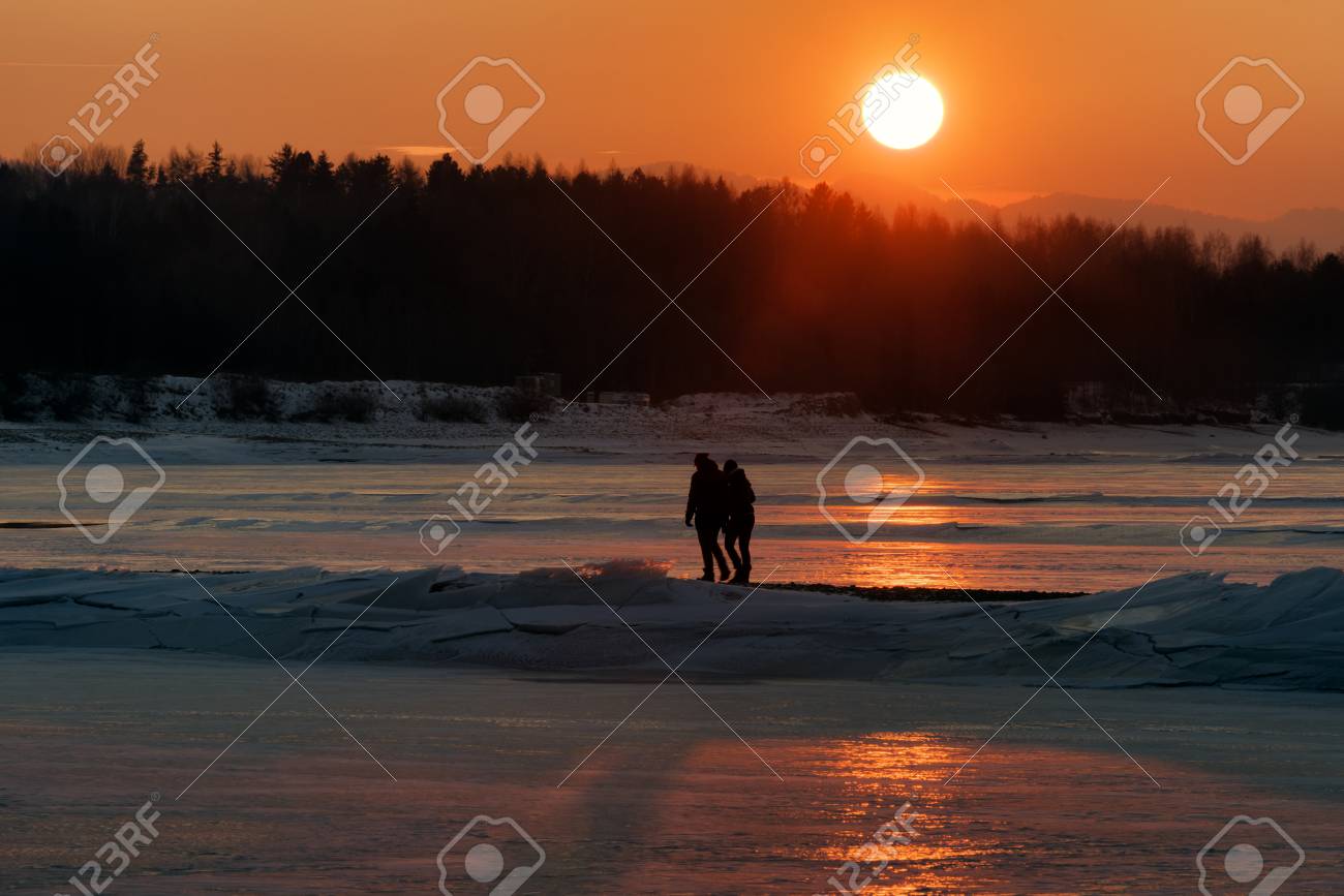 colorful sunset and couple