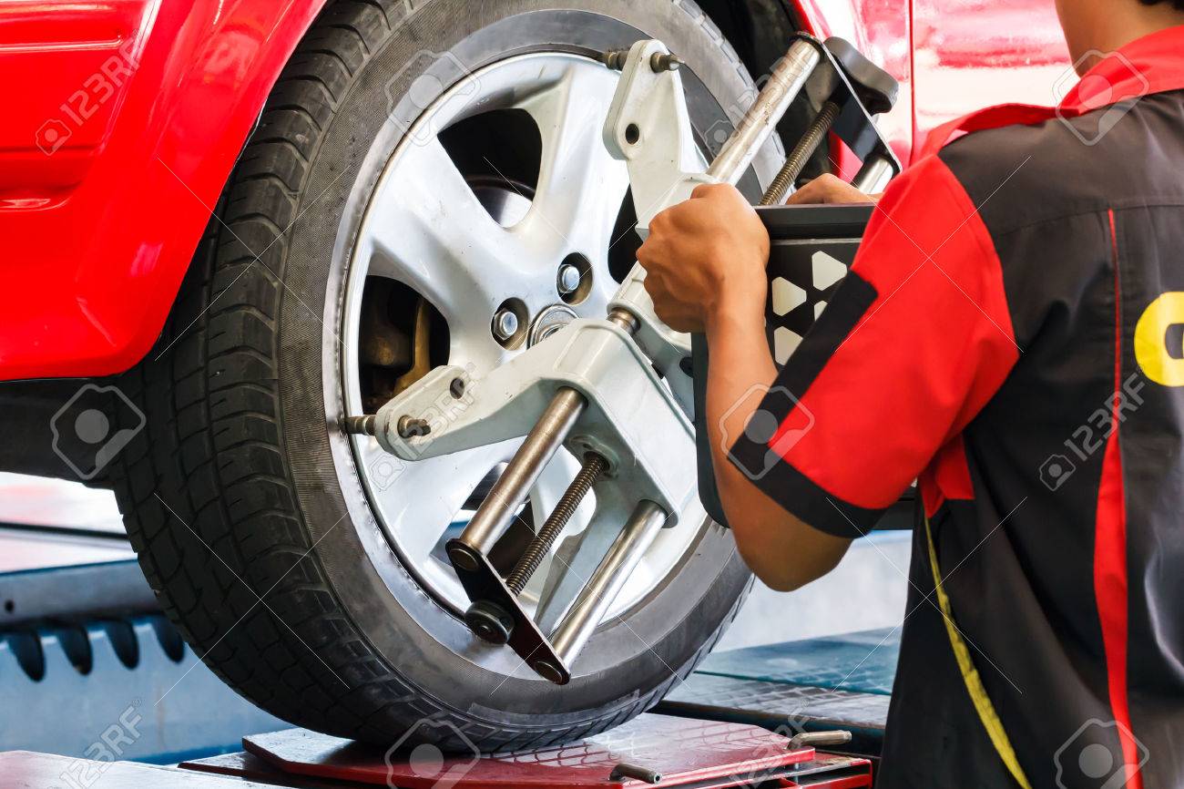 Wheel Alignment Machine >> Car Wheel Fixed With Computerized Wheel Alignment Machine Clamp Wheel Alignment Machine >> Car Wheel Fixed With Computerized Wheel Alignment Machine Clamp