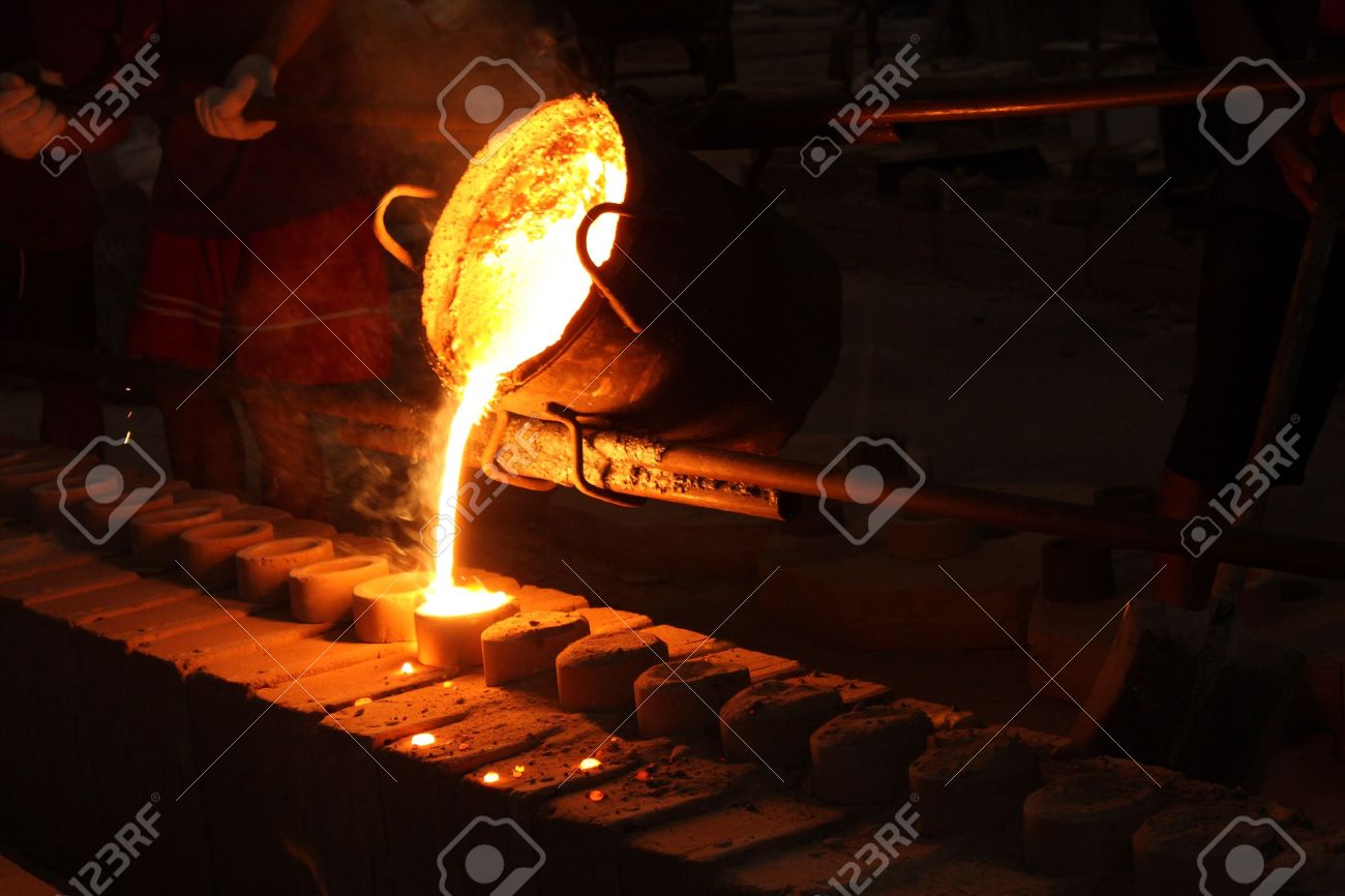 Molten Metal Poured From Ladle For Casting Stock Photo, Picture and Royalty  Free Image. Image 13512713.