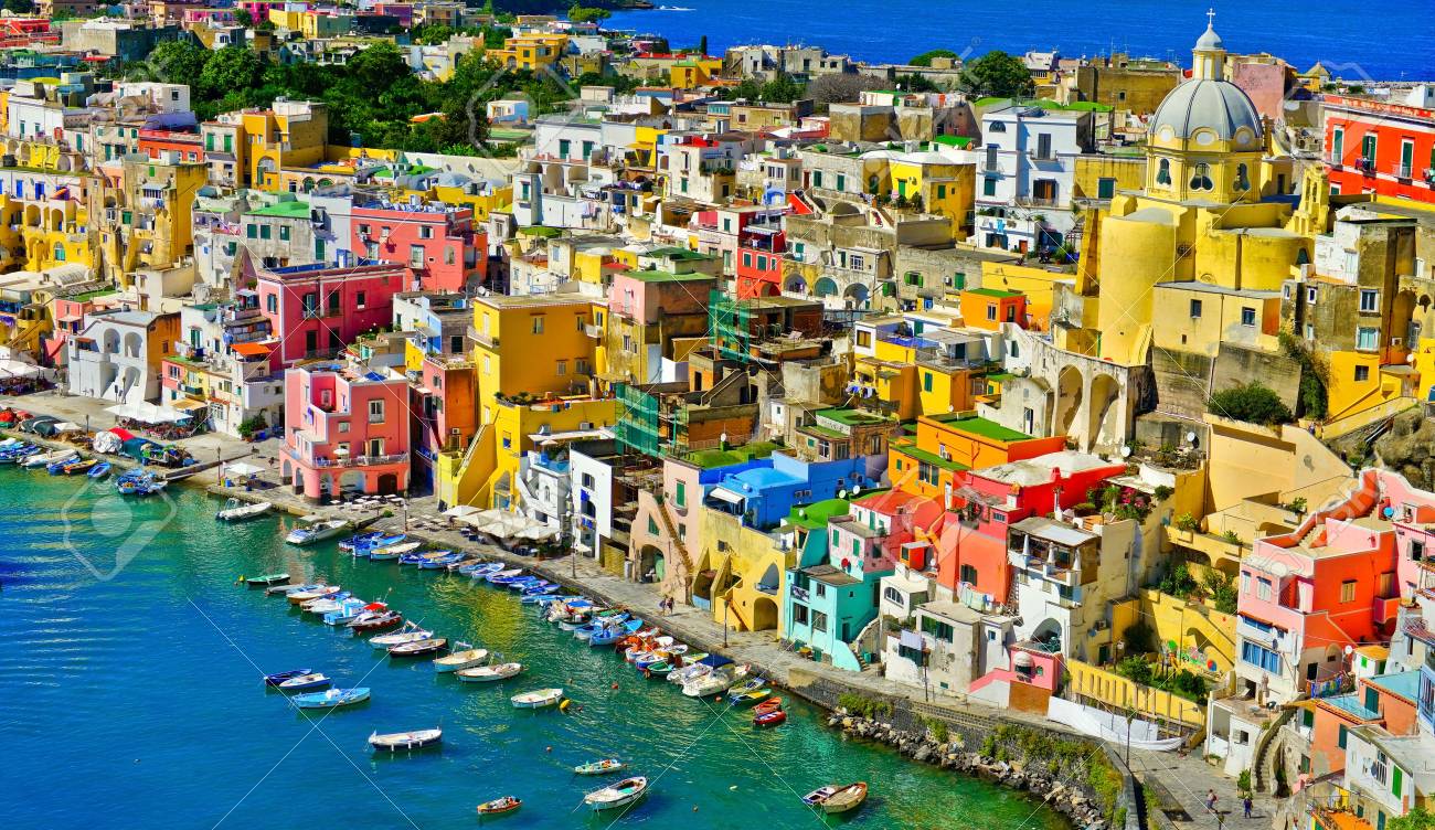 View Of The Port Of Corricella With Lots Of Colorful Houses On A