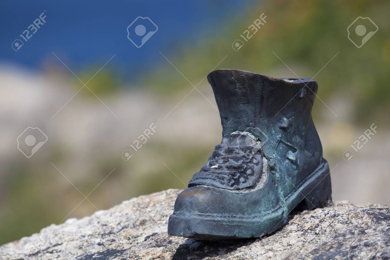 Bota de peregrino, Fisterra, Costa da morte, La Coruña, Galicia, España Bota de peregrino, Fisterra, Costa da morte, La Coruña, Galicia, España