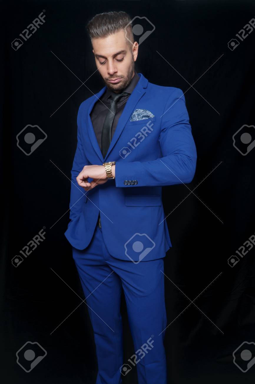 black shirt with blue suit