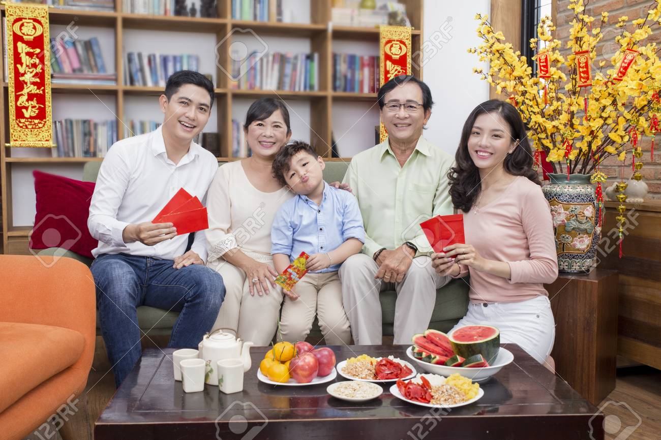 Vietnamese Family Celebrate Lunar New Year Stock Photo Picture And Royalty Free Image Image