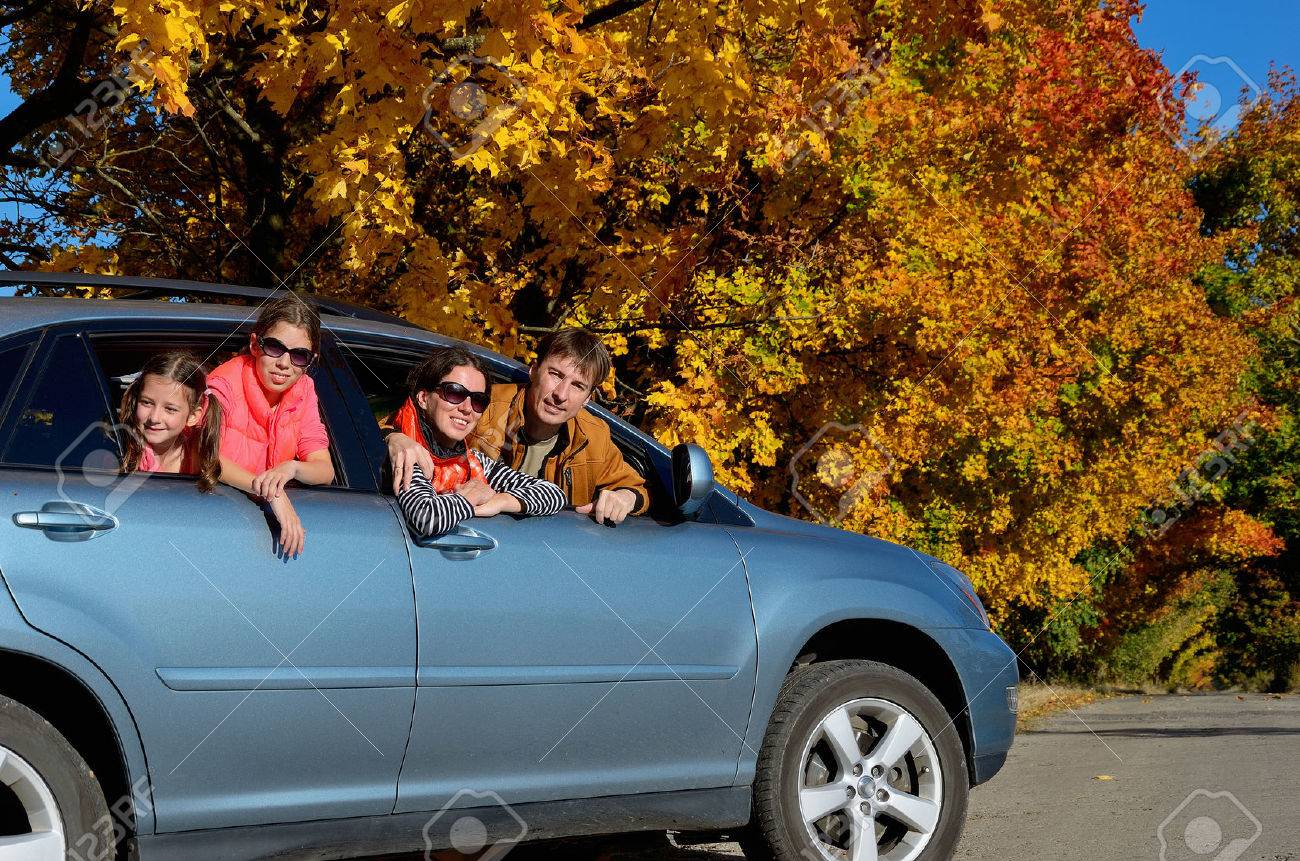 Car trip on autumn family vacation, happy parents and kids travel and have fun, car insurance concept - 32644727 Car trip on autumn family vacation, happy parents and kids travel and have fun, car insurance concept - 32644727