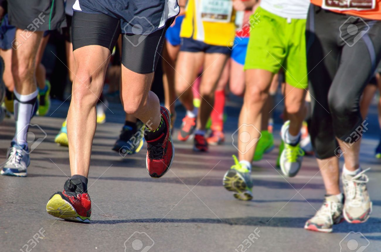 Marathon running race, people feet on road, sport, fitness and healthy lifestyle concept - 35688222 Marathon running race, people feet on road, sport, fitness and healthy lifestyle concept - 35688222