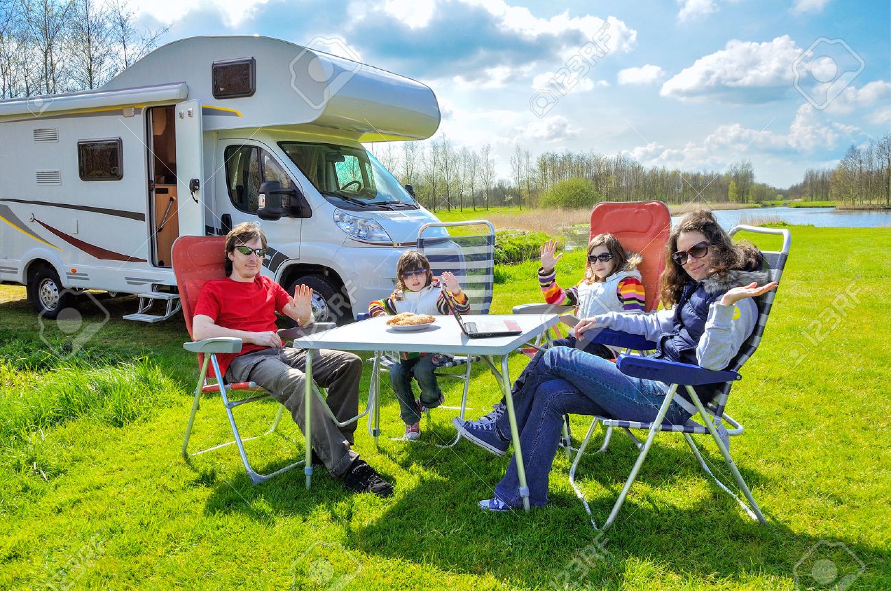 Family vacation RV camper travel with kids happy parents with children on holiday trip in motorhome - 39487456 Family vacation RV camper travel with kids happy parents with children on holiday trip in motorhome - 39487456