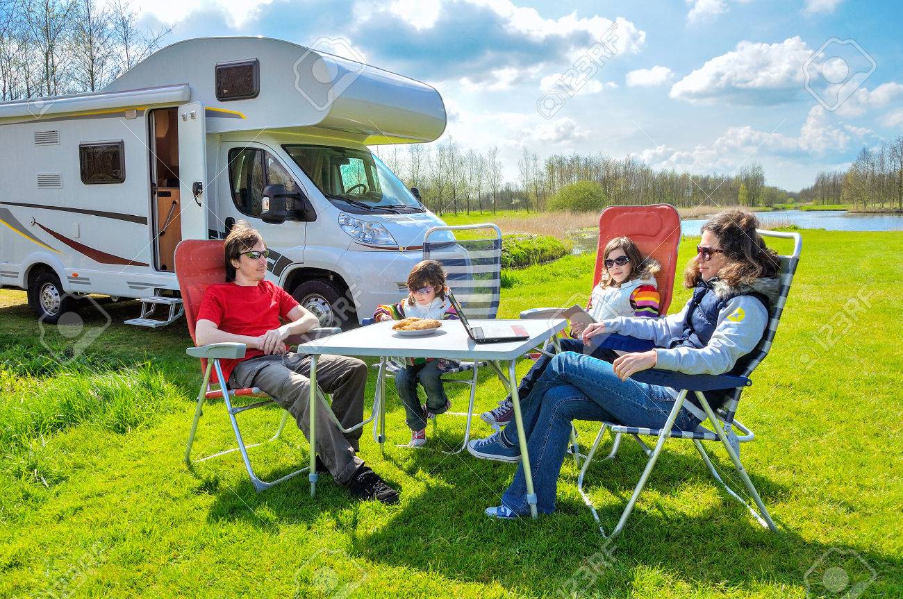 Family vacation RV camper travel with kids happy parents with children on holiday trip in motorhome - 39487457 Family vacation RV camper travel with kids happy parents with children on holiday trip in motorhome - 39487457