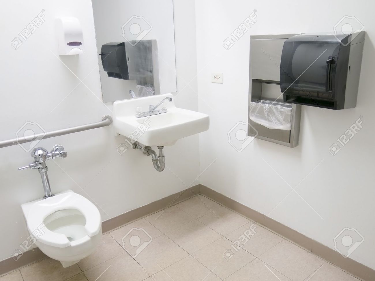 Disabled Toilet Clean Public Hospital Bathroom With Handrail Soap And Paper Towel Dispenser Disabled Toilet Clean Public Hospital Bathroom With Handrail Soap And Paper Towel Dispenser
