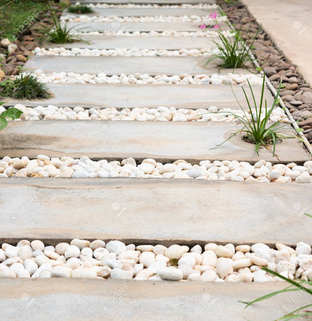 white pebble stone landscaping