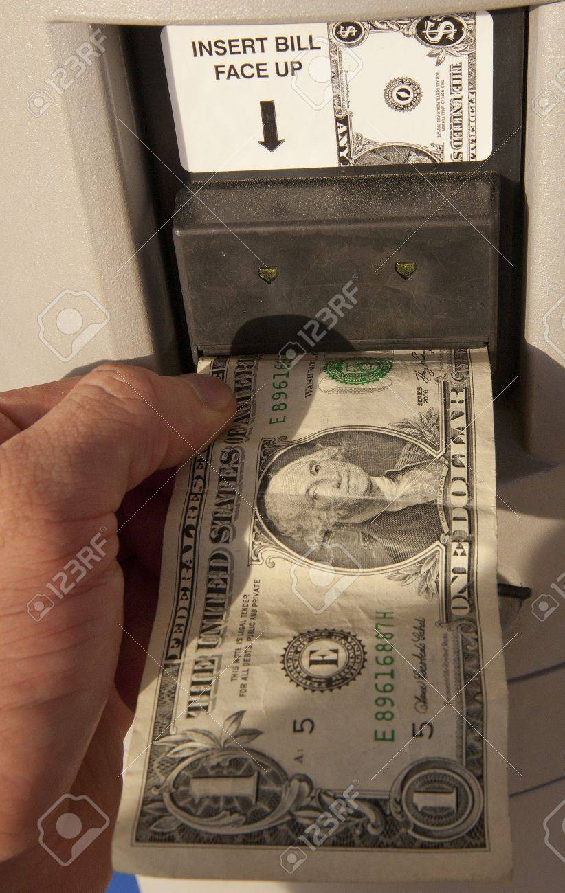 Feeding A Dollar Bill Into A Vending Machine Stock P O 19145424 Feeding A Dollar Bill Into A Vending Machine Stock P O 19145424