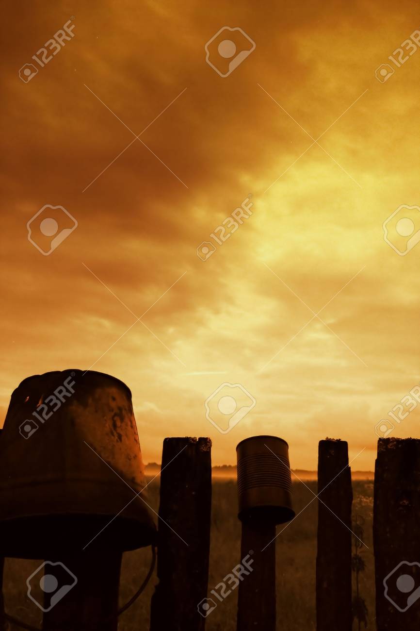 sunset view in a countryside fence stock photo picture and royalty