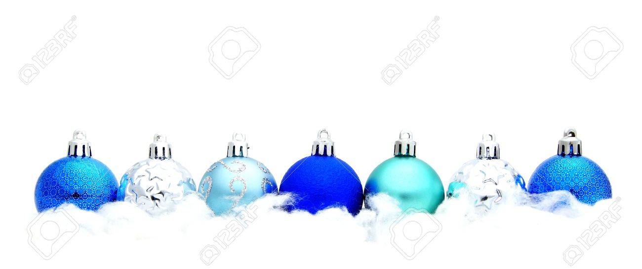 blue christmas bauble border in snow over a white background stock blue christmas border