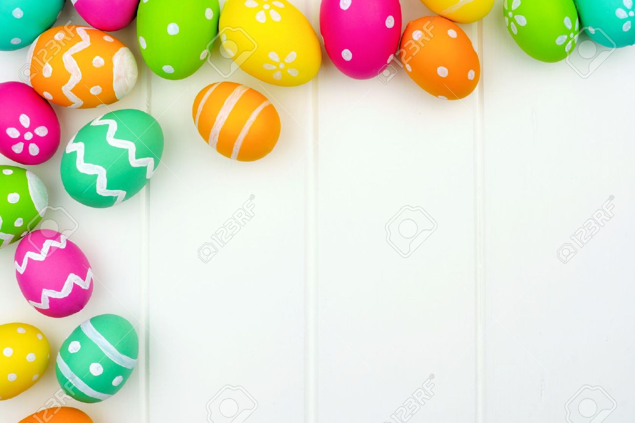 colorful easter egg corner border against a white wood background easter egg background