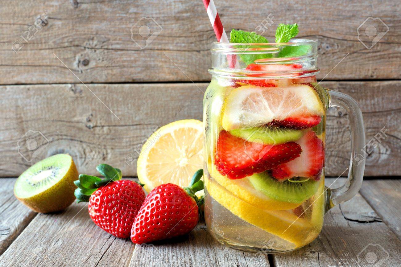 Lemon Strawberry Kiwi Detox Water In A Mason Jar Glass Against Stock Photo Picture And Royalty Free Image Image 70342403