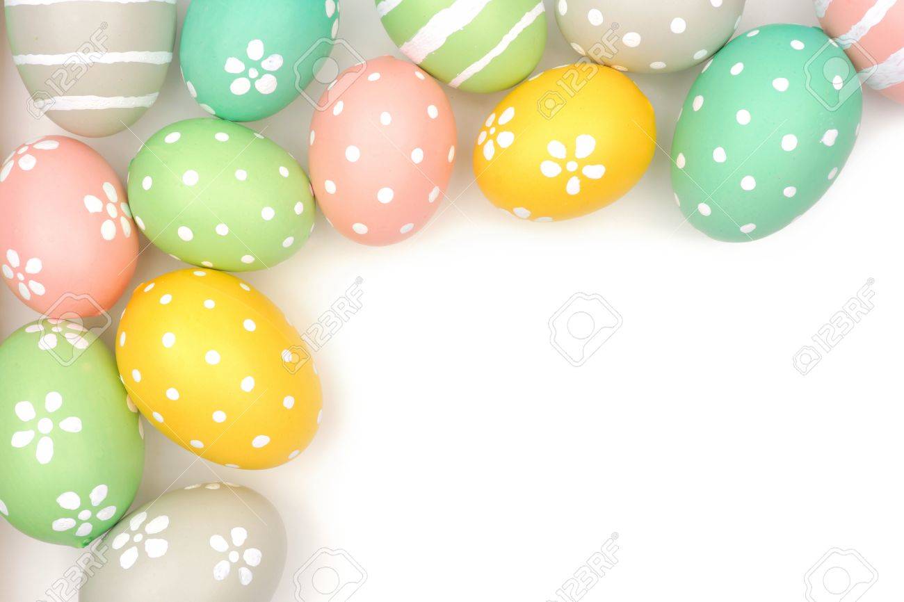 corner border of hand painted pastel easter eggs over a white easter egg boarder