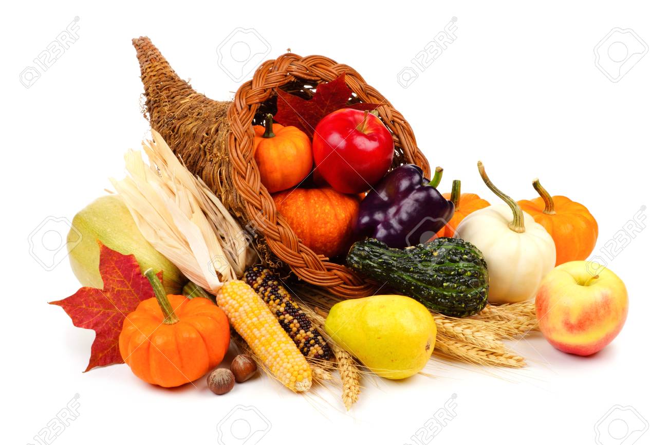 Thanksgiving cornucopia filled with fruit and vegetables isolated on a white background - 87237781 Thanksgiving cornucopia filled with fruit and vegetables isolated on a white background - 87237781