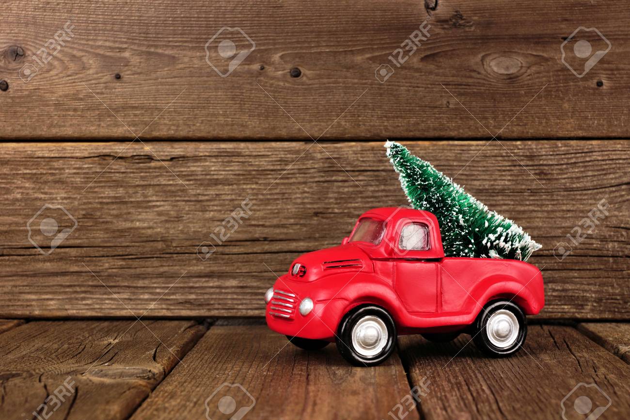 red toy truck with christmas tree