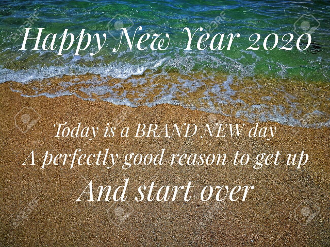 New Year Quote On Blurred Sandy Beach Background Stock Photo ...