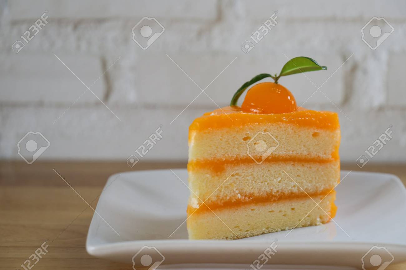 Stück Orange Kuchen Auf Holztisch Lizenzfreie Fotos, Bilder Und ... Stück Orange Kuchen Auf Holztisch Lizenzfreie Fotos, Bilder Und ...