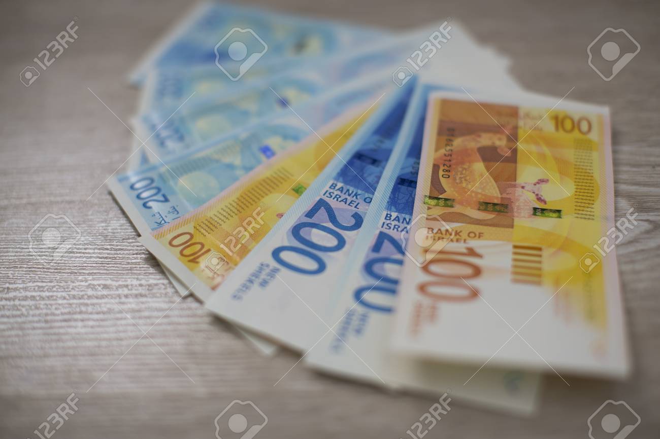 Israeli Money Stack Of The New Israeli Money Bills Banknotes Of 50, 20, 100  And 200 Shekel. New Israeli Shekel Series C. Stock Photo, Picture and  Royalty Free Image. Image 97471354.