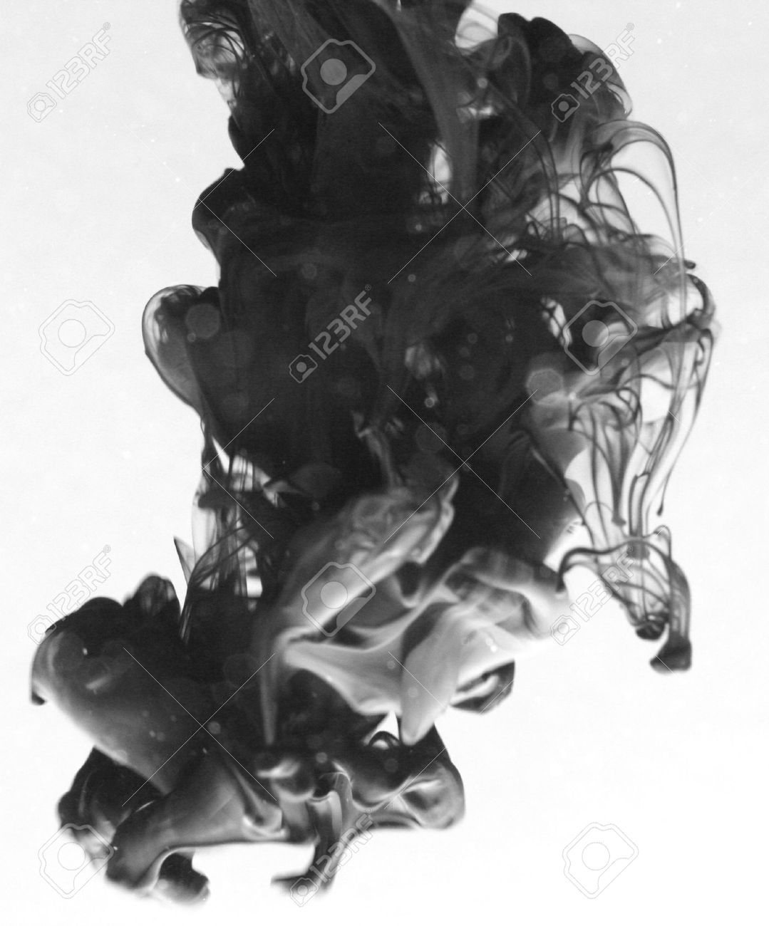 Smoke Liquid Ink In Water Stock Photo, Picture And Royalty Free Image. Image 9895569.