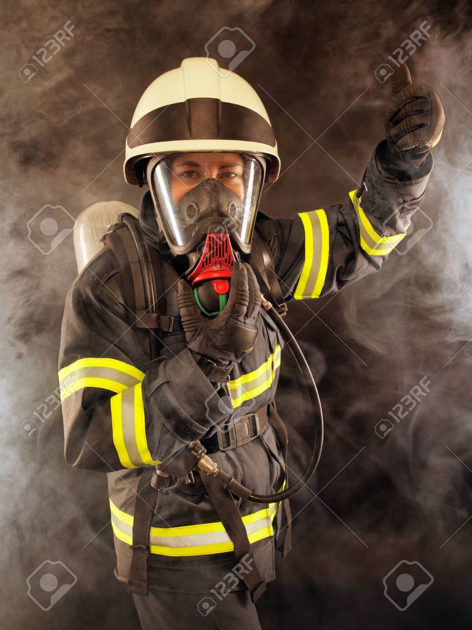 Firefighter wearing protective suit, helmet and mask - 25024987 Firefighter wearing protective suit, helmet and mask - 25024987