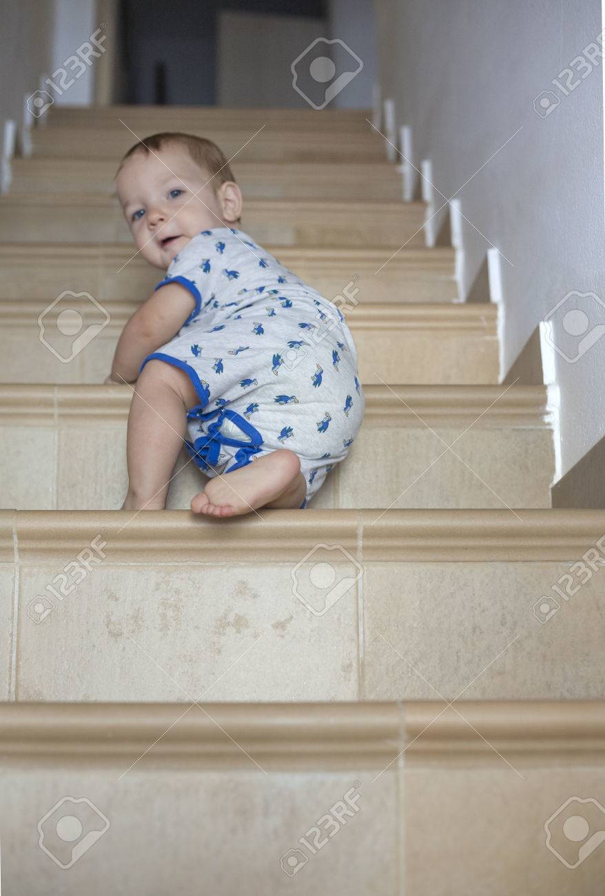 when do babies crawl up stairs