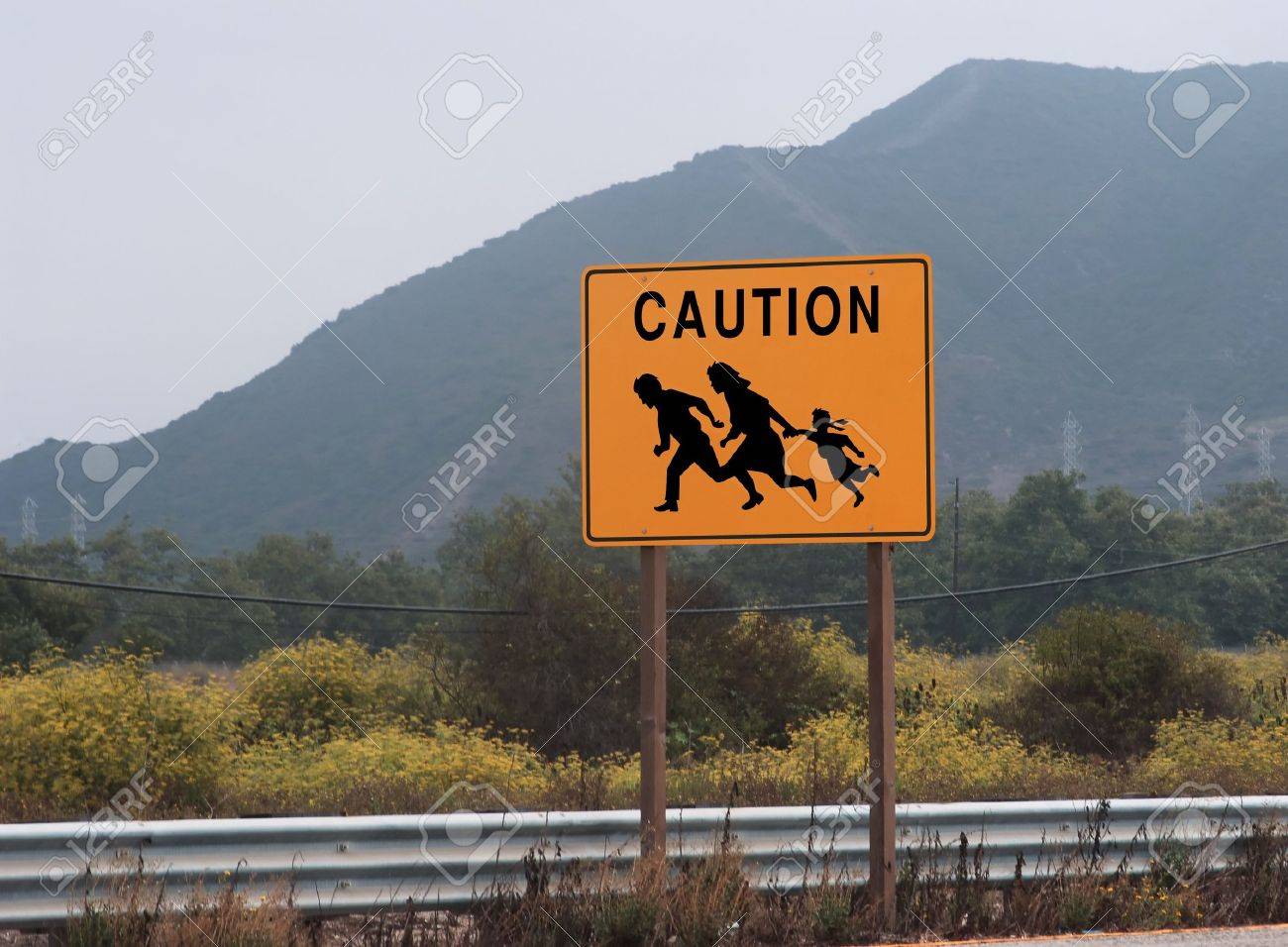 Immigrant Crossing Road Sign