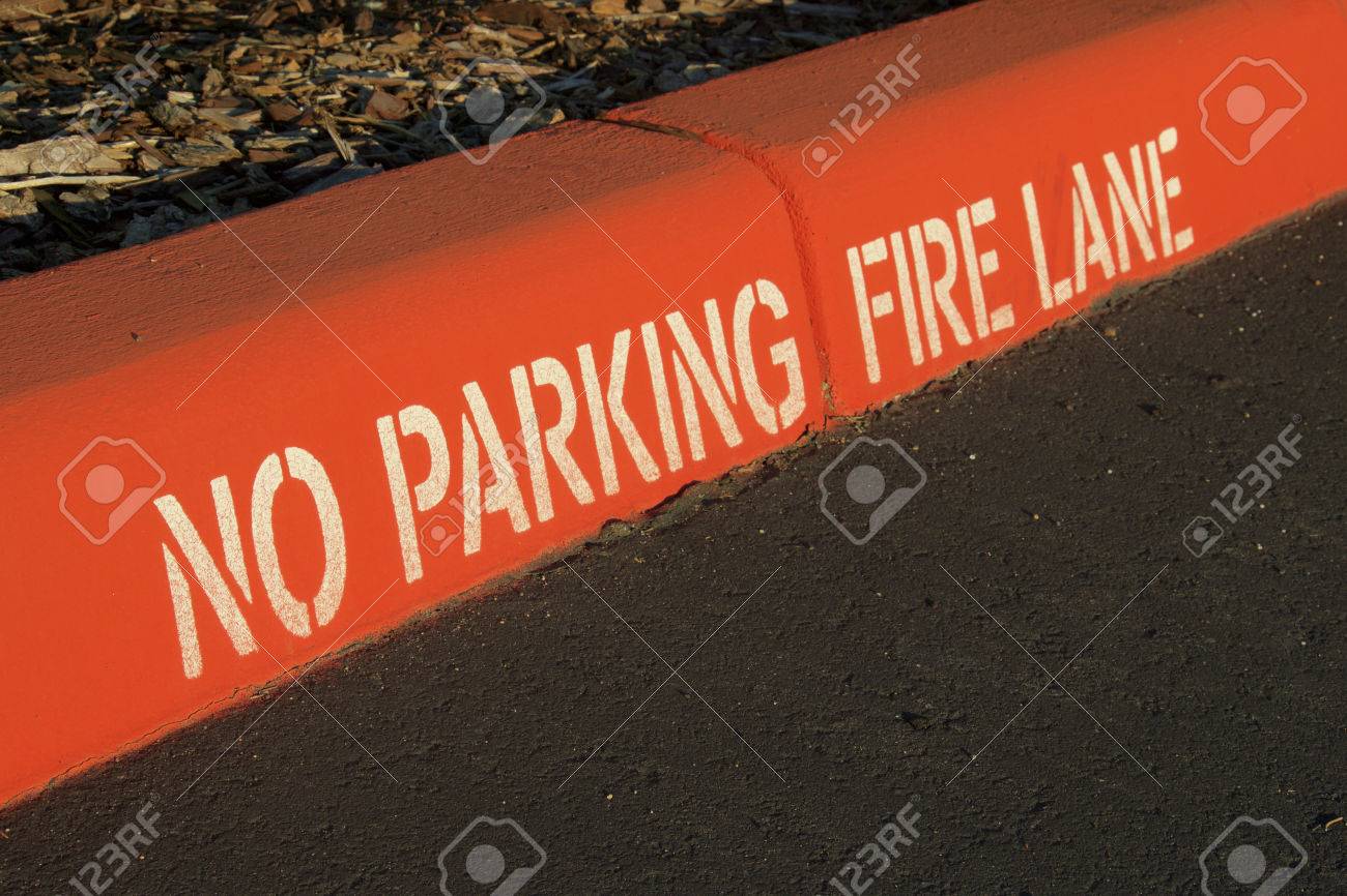 Painted Red Curb With No Parking And Fire Lane Stock Photo Picture And Royalty Free Image Image