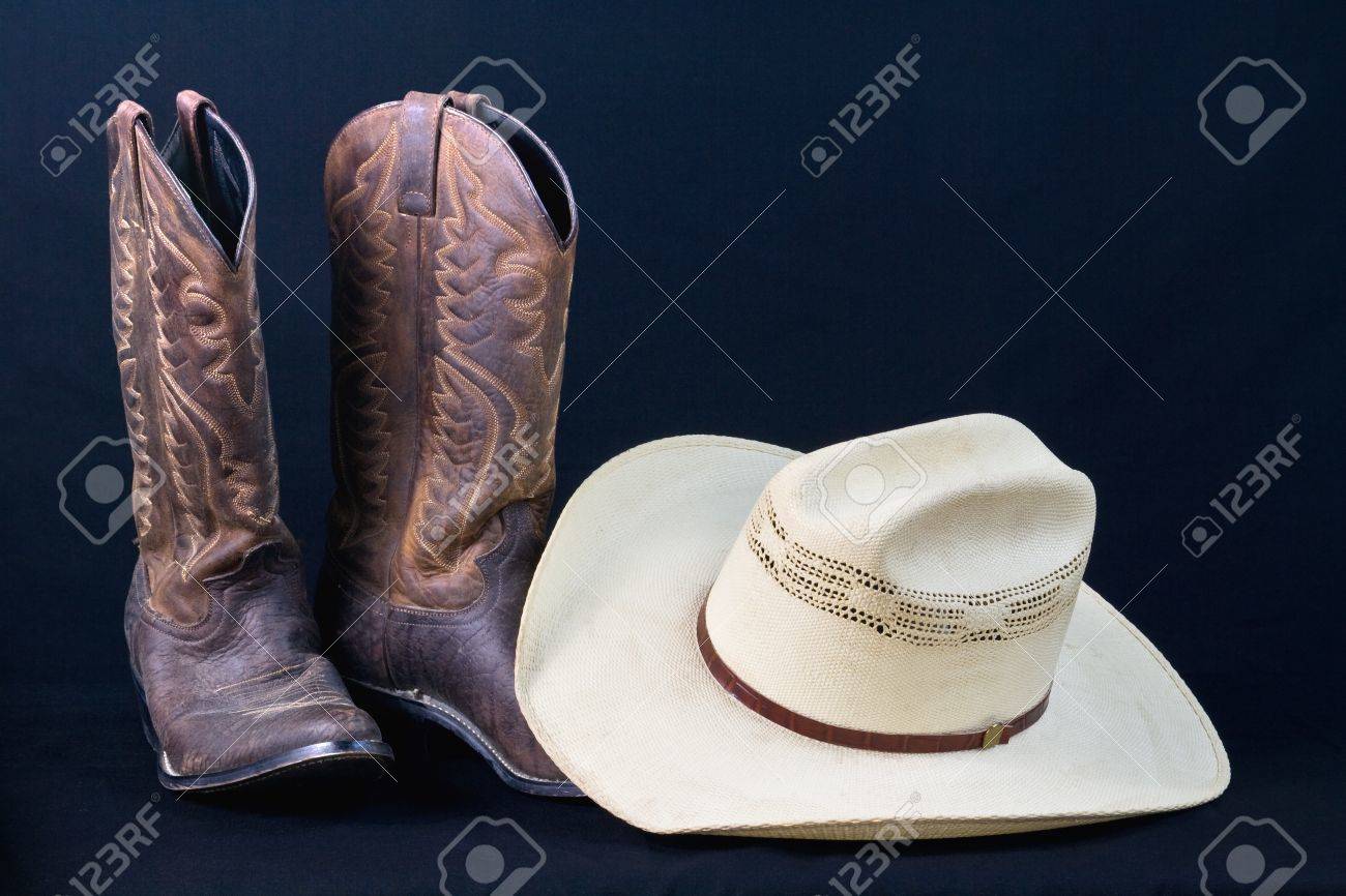 Cowboy Boots And Cowboy Hat With Black Background Stock Photo Picture And Royalty Free Image Image