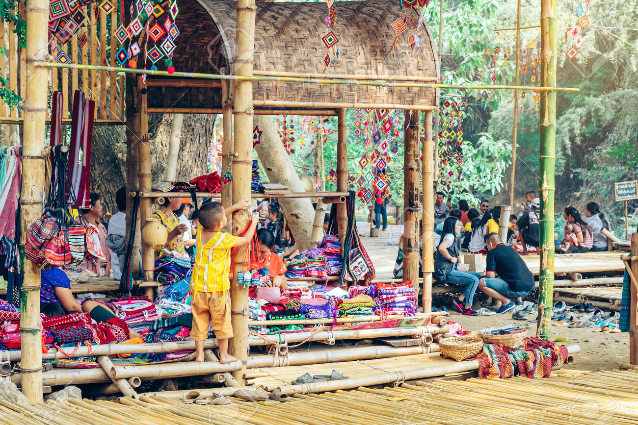 RATCHABURI THAILAND-JANUARY 19, 2020 : Handicrafts, homemade food, cotton clothes and more from local Karen villagers come to forming community and setting local market called Ohpoi Market in Ratchaburi Thailand. - 139426104 RATCHABURI THAILAND-JANUARY 19, 2020 : Handicrafts, homemade food, cotton clothes and more from local Karen villagers come to forming community and setting local market called Ohpoi Market in Ratchaburi Thailand. - 139426104