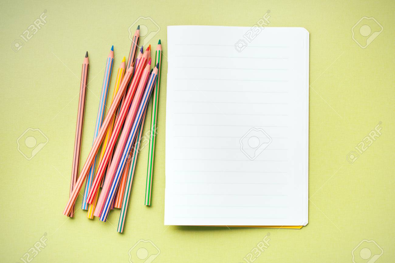 the colour pencils and blank workbook stock photo picture and workbook stock