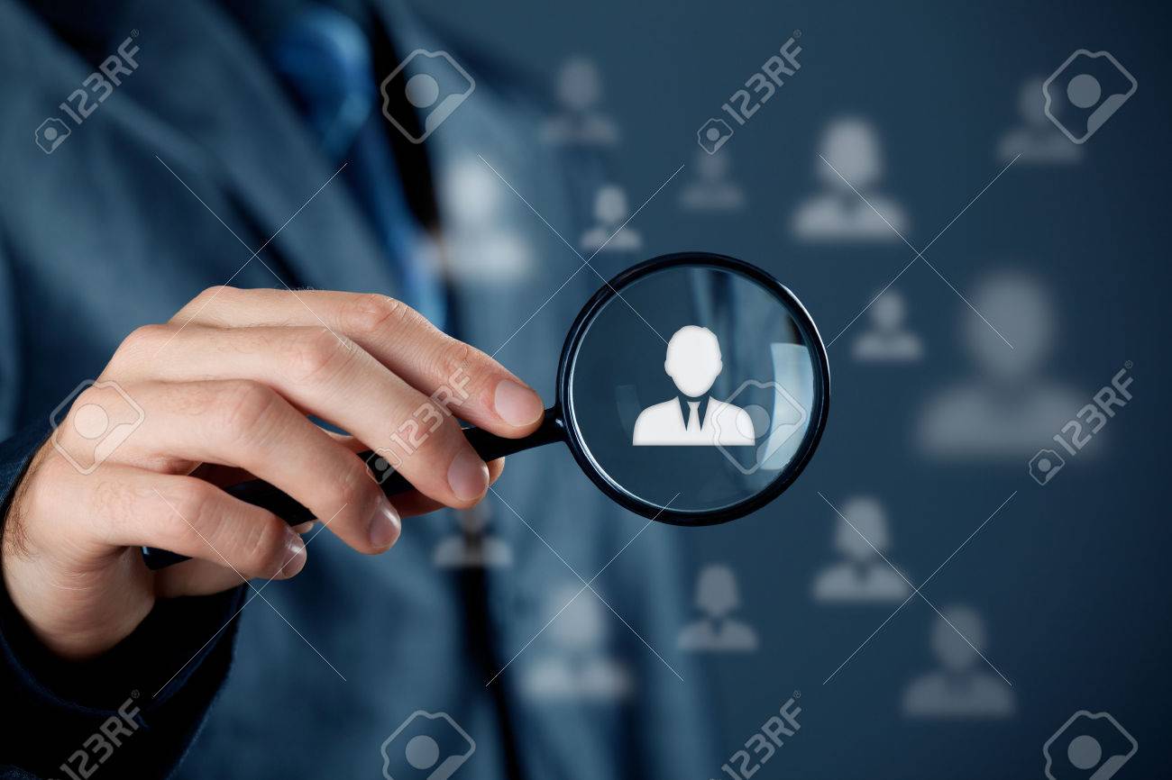 Individual customer service care, personalization, marketing segmentation and targeting, customer relationship management (CRM) and headhunter human resources concepts. Businessman with magnifying glass focused on one person. - 36982546 Individual customer service care, personalization, marketing segmentation and targeting, customer relationship management (CRM) and headhunter human resources concepts. Businessman with magnifying glass focused on one person. - 36982546
