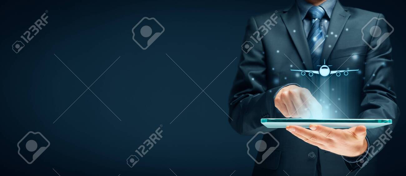 Air ticket booking on digital tablet app or online travel insurance concepts. Person with digital tablet and symbol of a plane. - 120716726 Air ticket booking on digital tablet app or online travel insurance concepts. Person with digital tablet and symbol of a plane. - 120716726
