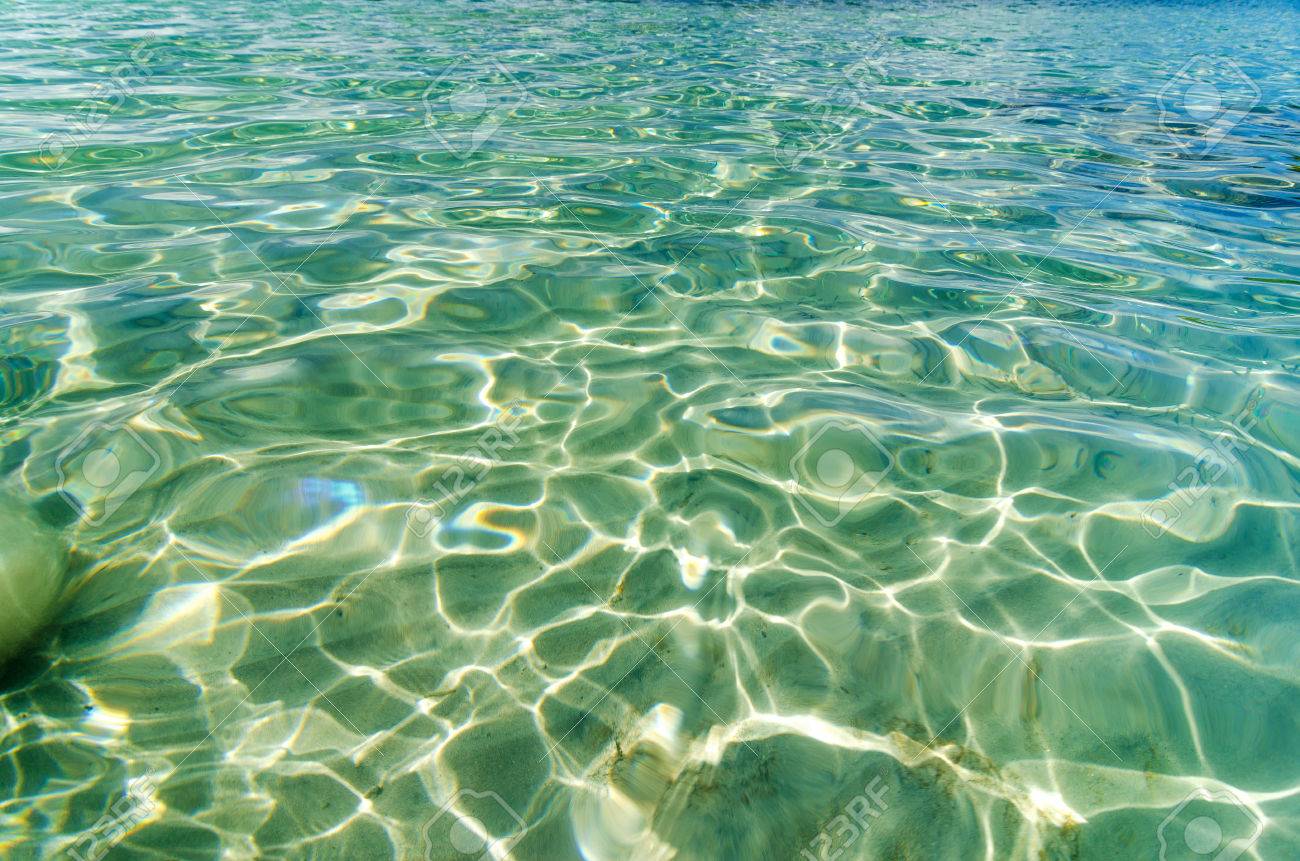 Sunlight Reflecting In Beautiful Crystal Clear Caribbean Water