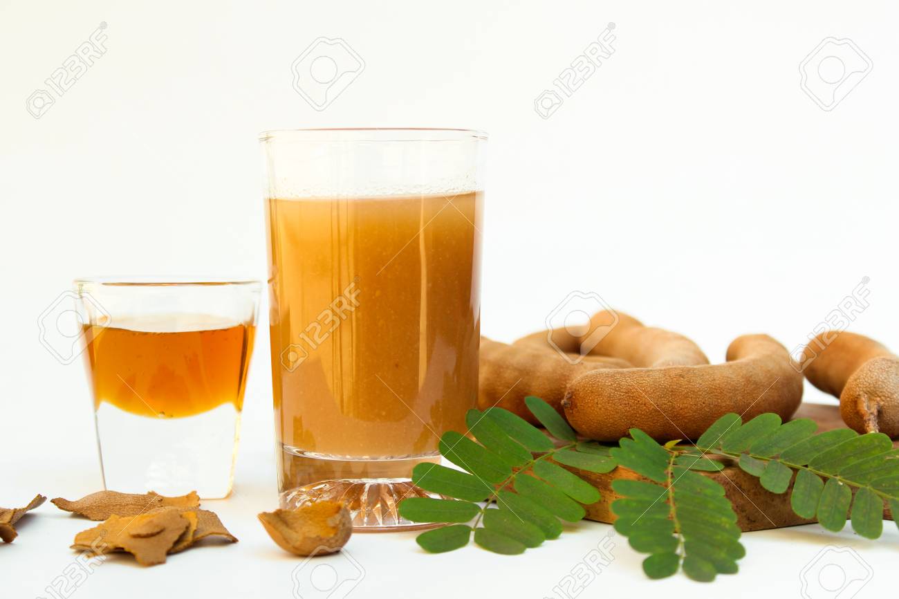 Tamarind And Tamarind Juice With Honey On White Background Stock Photo Picture And Royalty Free Image Image